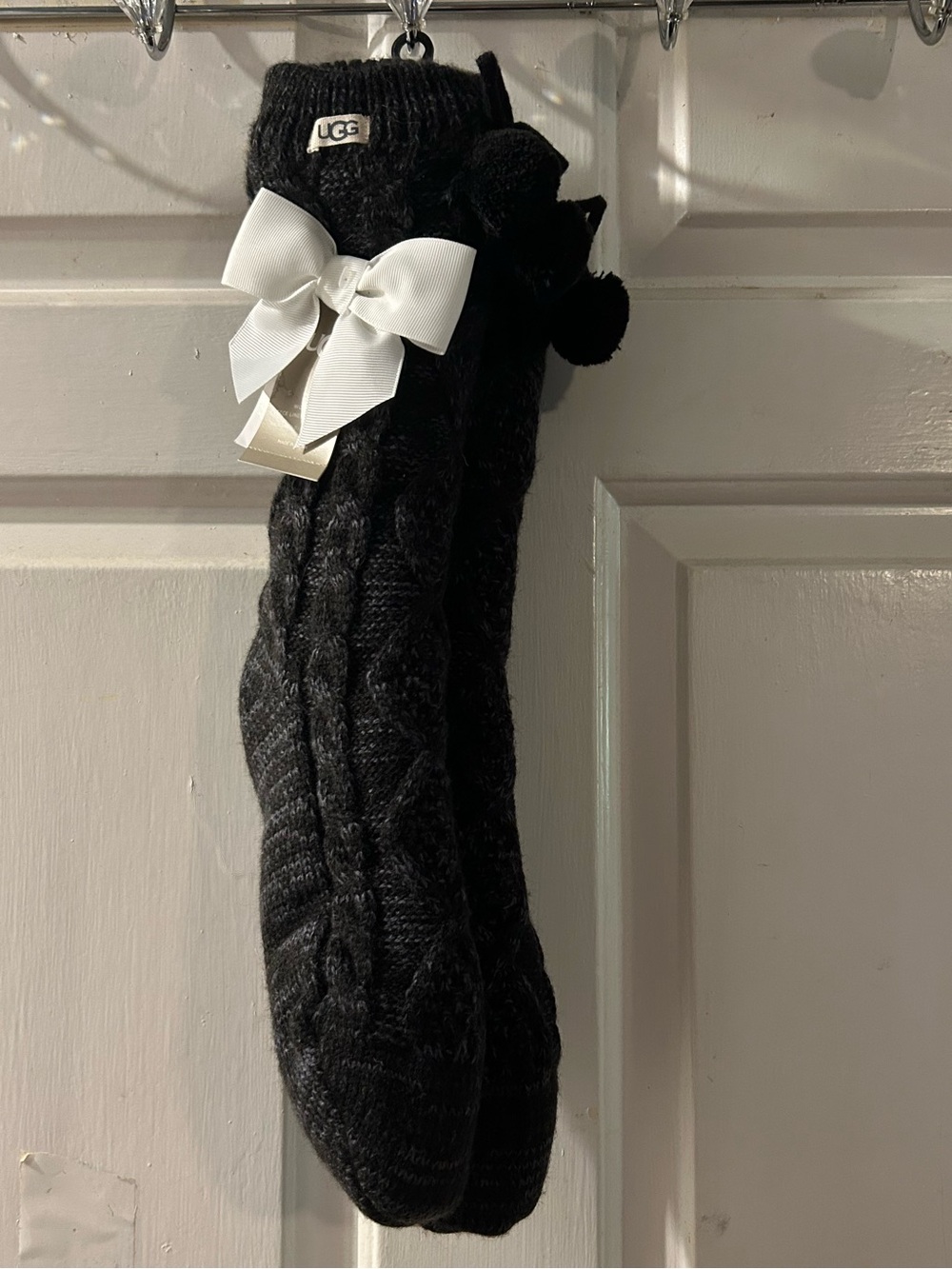 UGG Black Cable-Knit Knee-High Socks with White Bow & Pom Accents